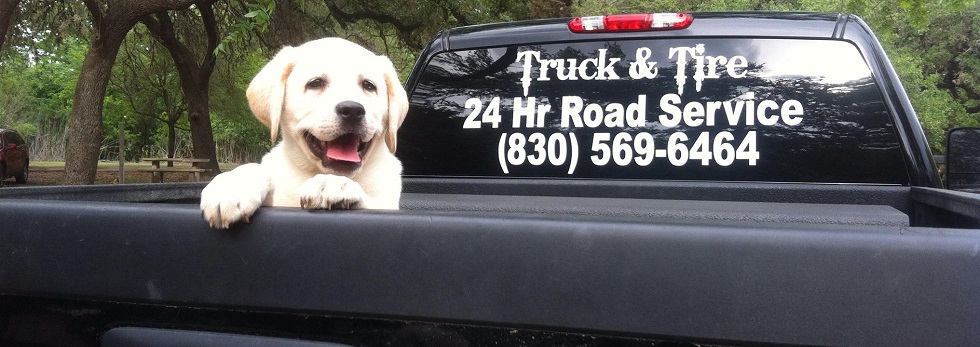 24-hour roadside truck with Labrador puppy 